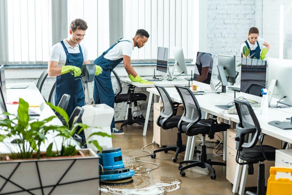 Commercial cleaning team cleaning an office